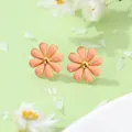 Pink daisy flower stud earrings in titanium steel measuring 1.2cm and weighing 2.3g - Nude