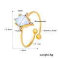 Detailed view of titanium steel ring with light blue opal and sparkling rhinestones - Size 7 (Adjustable) / Gold Teardrop Style (A139)