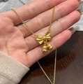 Golden bow necklace with lily of the valley pendants in a refined matte finish - Gold Bow Lily Valley Necklace (Curb Chain)