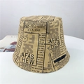 Detail of khaki bucket hat featuring vintage black newspaper print on stiff cotton canvas - 56-58cm (Adjustable) / Khaki