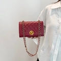 Elegant wine red quilted crossbody bag with a gold twist lock and chain strap - Red