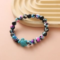 Unisex turquoise turtle charm bracelet with colorful beads on a ripple base - Multi-color Spotted Turquoise Turtle Bracelet