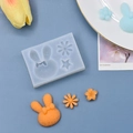 Dettaglio stampo in silicone con forme di coniglio e stella e creazioni rifinite - Stampo Rettangolare Coniglio Fiore Stella (1)