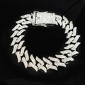 Macro shot of silver hip hop Cuban chain with thorns and sparkling crystal pavé - 20cm / Silver
