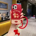 Close-up of red iPhone case with Luck Horse design and matching charm strap - Pp Spring Festival * Red Polka Dots For Instant Wealth + Handbag / iPhone15