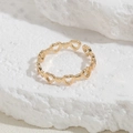 Bague réglable plaquée or élégante avec un motif ajouré en forme de cœur continu - Bague Cœur Ajourée / Doré