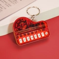 Miniature red transparent piano keychain toy with musical notes and numeric keys - Bag Packaging / Transparent Red