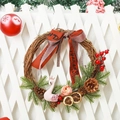 Christmas wreath with pink glitter swan pinecones and berries on a natural vine ring - Swan Style