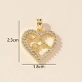 Macro detail of gold-tone heart pendant with cubic zirconia and size measurements - 0228-6/Gold Double Hollow Heart
