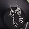 Punk gothic skull and bone hand earrings in vintage silver finish for Halloween - Bandana Skull Bone Hand / Antique Silver