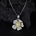 Elegant silver flower pendant necklace with opal center and blue cubic zirconia stones - Natural Opal Silver