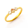 Three-stone titanium steel ring with champagne and white round cubic zirconia in gold - US 6 / Gold Champagne and White Zirconia