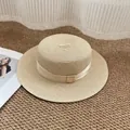 Classic beige flat-top boater hat with matching wide ribbon and woven paper straw texture - M / Beige with Beige Bow