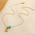 Collier doré minimaliste avec perles turquoise et pendentif coquillage sur tissu tressé - Doré