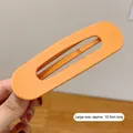 Large matte orange hollow oval hair clip for women with 10.5cm length design - Ginger Yellow