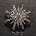 Silver snowflake brooch with white rhinestones measuring 4.3cm by 4.3cm and 11g weight - Silver Snowflake (XD9410-1)