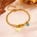 Golden stainless steel bracelet with blue heart pendant and engraved heart charm - Heart & Turquoise Charm Bracelet