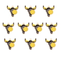 Macro view of 10 pieces black alloy bull head charms with yellow flower details - 2# Cow Skull With Flower (10 Pcs)
