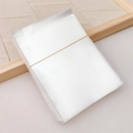 Clear plastic packaging bags for hair accessories bundled with yellow elastic bands - 8.9x11cm Clear Bag / 1 Piece