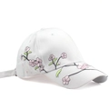 Detail of pink cherry blossom embroidery on white cotton baseball cap with twill texture - Plum Blossom White
