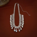 Detail of a luxury layered silver-tone necklace with geometric diamond fringes - Silver