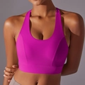 Close-up of seamless racerback sports bra with wide straps in deep magenta - S / Azalea Pink