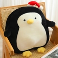 Plush penguin toy with red Christmas hat and black and white soft fur finish - Black