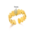 Close-up of vintage 18K gold plated leaf ring with a 7mm oval green natural stone - Gold Light Green Gemstone