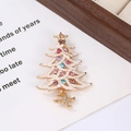 Detail view of a gold Christmas tree brooch with white enamel and colorful rhinestones - Style 8 (5.9*3.9cm)