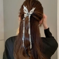 Détail d'une pince à cheveux papillon argentée avec de longs glands métalliques - 2# Grand Modèle Papillon Argenté avec Franges en Alliage