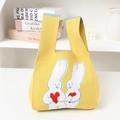 Cute yellow knit tote bag featuring white rabbit and red heart patterns in home setting - Yellow Heart Rabbit