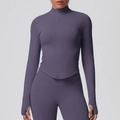 Detailed view of women's zip-up sports jacket with ribbed contouring and thumbhole cuffs - Truffle