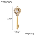 Macro view of a 3.3cm gold heart key pendant with white rhinestones and a central stone - AP41957D9A2-White Zircon Heart Key
