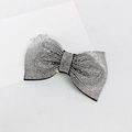 Detailed macro view of the sparkling rhinestone bow hair clip with layered 3D design - 8cm Medium Fine Rhinestone Single Knot White