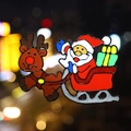 Sparkly Santa Claus on sleigh window sticker with glitter finish and reindeer design - Reindeer Sleigh