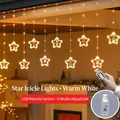 Star-shaped LED Christmas curtain light with warm white glow and 8 mode remote control - Star Style