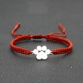 Handmade red braided cord lucky bracelet with silver paw print charm for women and men - Red