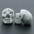 Howlite white stone skull carving with natural grey texture for Halloween decor - Howlite