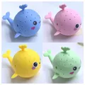 Set of four colorful squeeze octopus bath toys in blue, pink, yellow, and green colors - Bath Whale 2pcs