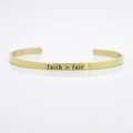Polished gold 4mm stainless steel cuff bracelet with faith over fear engraving - faith > fear