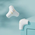 Due paraspigoli in silicone bianco con design a mostro per la sicurezza dei bambini - Angolo Dinosauro Corto Bianco