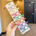 Set of seven matte rabbit ear hair clips in assorted macaron colors on display card - Rabbit 7-Color Set