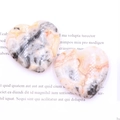 Polished heart-shaped natural agate stone with unique grey and orange marble texture - Crazy Agate