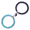 Detail of 8mm couple bracelets with black matte beads and Yin Yang Tai Chi charm - Black and Green Tai Chi (Style-6)