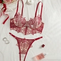 Detailed flat lay of red floral embroidery lace bra and thong with diamond accents - S / Red