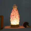 Pineapple night light crafted from natural pink crystal stones on a wooden base - Rose Quartz Pineapple Lamp