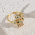 Golden bear open ring featuring colorful zircon stones on a textured stone surface - Teddy Bear Ring Multicolor Zirconia-JZ0263