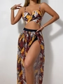 Detail view of tropical leaf print mesh skirt and halter bikini set with cut-out design - S / Orange
