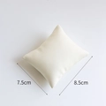 Beige PU leather watch pillow for jewelry display measuring 7.5cm by 8.5cm - Faux Leather / Small (7.5*8.5cm) / Off White