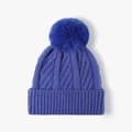Cozy blue cable-knit beanie hat featuring a fluffy pom-pom and ribbed cuff detail - One Size / Blue
